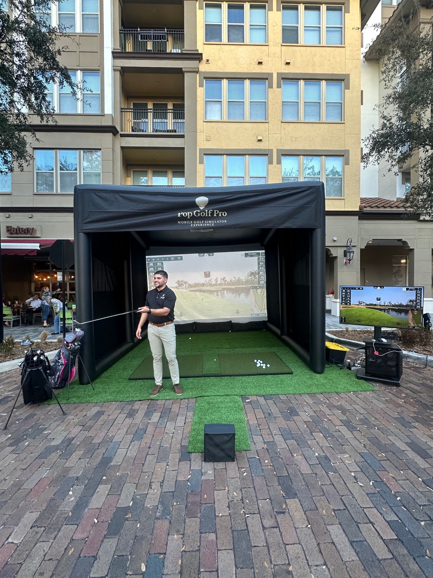 Pop Golf Pro team setup at event